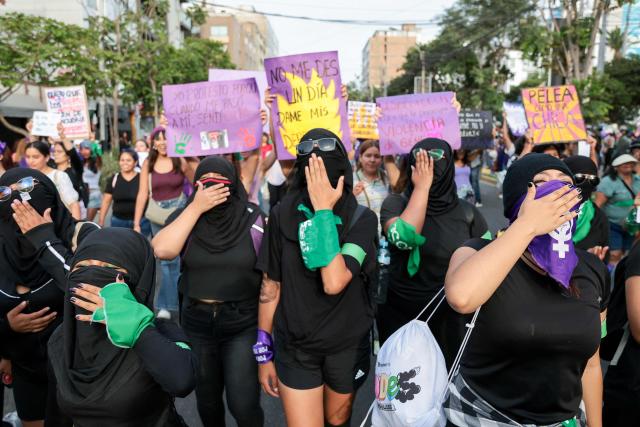 Demonstrators take part in a march on the eve of International Women's Day in Lima on March 7, 2026. (Photo by Connie FRANCE / AFP)