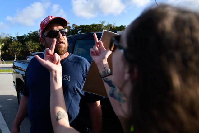 Anti-Trump protesters march towards Mar-a-Lago while clashing with supporters of Donald Trump during a demonstration in Palm Beach, Florida, on March 7, 2026. (Photo by Octavio JONES / AFP)