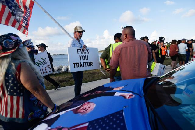 Anti-Trump protesters march towards Mar-a-Lago while clashing with supporters of Donald Trump during a demonstration in Palm Beach, Florida, on March 7, 2026. (Photo by Octavio JONES / AFP)