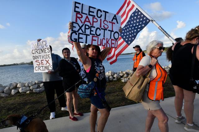 Anti-Trump protesters march towards Mar-a-Lago while clashing with supporters of Donald Trump during a demonstration in Palm Beach, Florida, on March 7, 2026. (Photo by Octavio JONES / AFP)