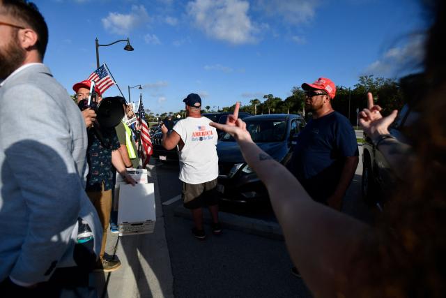 Anti-Trump protesters march towards Mar-a-Lago while clashing with supporters of Donald Trump during a demonstration in Palm Beach, Florida, on March 7, 2026. (Photo by Octavio JONES / AFP)