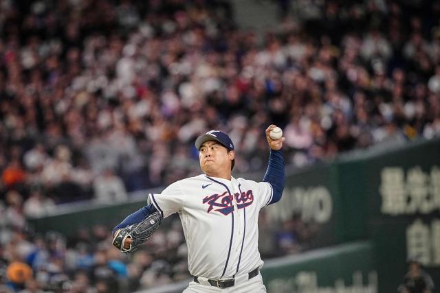 South Korea's Ryu Hyun-jin pitches during the World Baseball Classic (WBC) Pool C game between Taiwan and South Korea at the Tokyo Dome in Tokyo on March 8, 2026. (Photo by Yuichi YAMAZAKI / AFP)