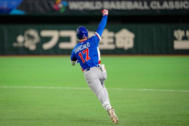 Taiwan’s Stuart Fairchild celebrates as he hits a two run home run during the World Baseball Classic (WBC) Pool C game between Taiwan and South Korea at the Tokyo Dome in Tokyo on March 8, 2026. (Photo by Yuichi YAMAZAKI / AFP)