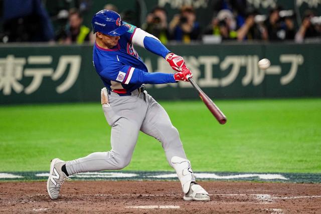 Taiwan’s Stuart Fairchild hits a two run home run during the World Baseball Classic (WBC) Pool C game between Taiwan and South Korea at the Tokyo Dome in Tokyo on March 8, 2026. (Photo by Yuichi YAMAZAKI / AFP)