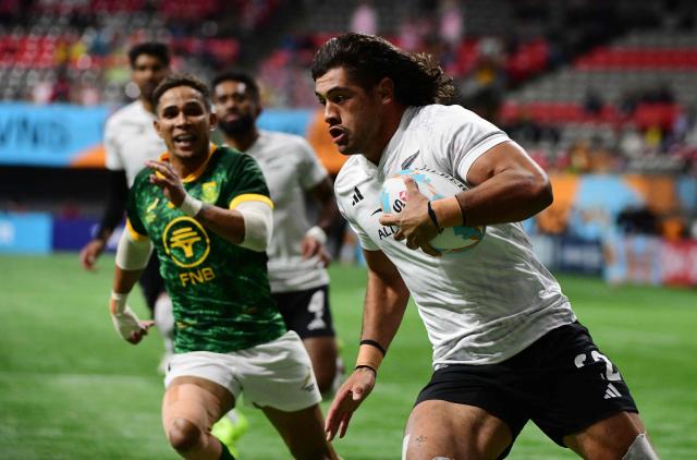 New Zealand’s Rob Rush scores a try against South Africa during the HSBC Canada Rugby Sevens tournament in Vancouver, Canada, on March 7, 2026. (Photo by Don MacKinnon / AFP)