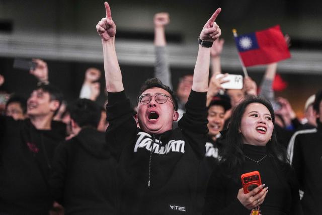Fans celebrate Taiwan's victory after the World Baseball Classic (WBC) Pool C game between Taiwan and South Korea at the Tokyo Dome in Tokyo on March 8, 2026. (Photo by Yuichi YAMAZAKI / AFP)