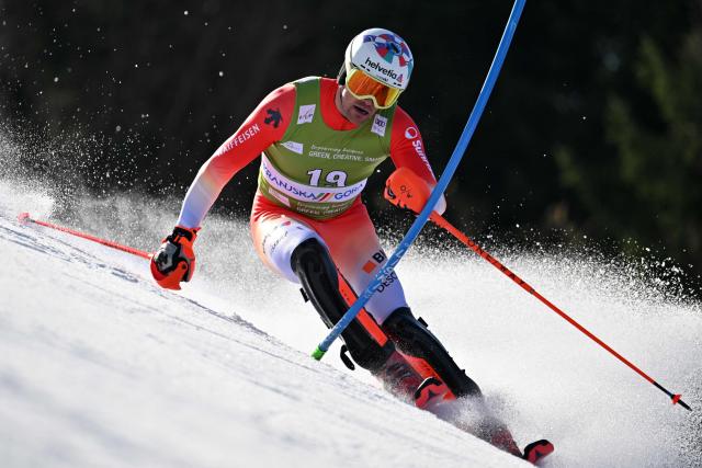 Switzerland's Daniel Yule competes in the first run of the Men's Slalom event, part of FIS Alpine Ski World Cup 2025-2026 in Kranjska Gora, Slovenia on March 8, 2026. (Photo by JURE MAKOVEC / AFP)