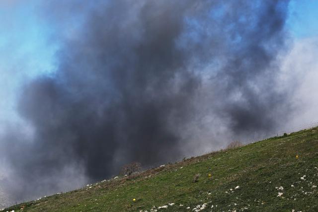 Smoke rises along the Israel-Lebanon border on March 8, 2026. Lebanon was drawn into the Middle East war on March 2, when Iran-backed militant group Hezbollah attacked Israel in response to the killing of Iranian supreme leader Ayatollah Ali Khamenei during US-Israeli strikes. Israel, which has kept up strikes targeting Hezbollah despite a 2024 ceasefire, launched multiple waves of strikes this week across Lebanon and sent ground troops into border areas. (Photo by Jack GUEZ / AFP)