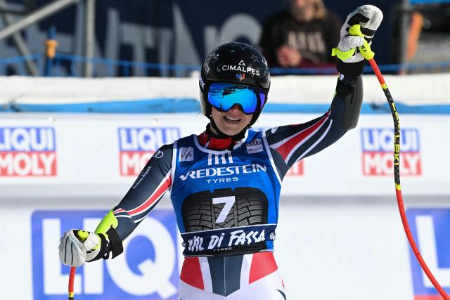 France's Romane Miradoli reacts after her run in the Women's Super G race of the FIS Ski World Cup at the La Volata slope in the Passo San Pellegrino ski area, Val di Fassa, Italy on March 8, 2026. (Photo by Andreas SOLARO / AFP)