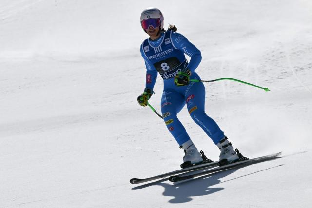 Italy's Elena Curtoni reacts after her run in the Women's Super G race of the FIS Ski World Cup at the La Volata slope in the Passo San Pellegrino ski area, Val di Fassa, Italy on March 8, 2026. (Photo by Andreas SOLARO / AFP)