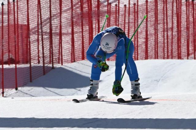 Italy's Elena Curtoni crosses the finish line of the Women's Super G race of the FIS Ski World Cup at the La Volata slope in the Passo San Pellegrino ski area, Val di Fassa, Italy on March 8, 2026. (Photo by Andreas SOLARO / AFP)