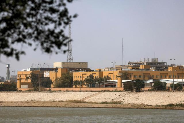 The US embassy headquarters in Iraq is pictured in Baghdad's fortified "Green Zone" on March 8, 2026. Air defence systems intercepted rockets fired at the US embassy in Baghdad late on March 7, security sources told AFP. It is the first such attack on the embassy in Baghdad since the start of the war in the Middle East, triggered by a joint US-Israeli attack on Iran, into which Iraq has been dragged. (Photo by AHMAD AL-RUBAYE / AFP)