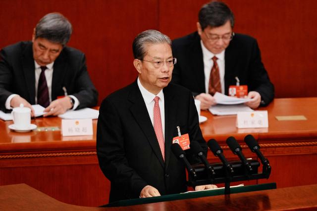 Chairman of the Standing Committee of the National People's Congress Zhao Leji speaks during a plenary session of China's National People's Congress (NPC) at the Great Hall of the People in Beijing on March 9, 2026. (Photo by Vincent Thian / POOL / AFP)