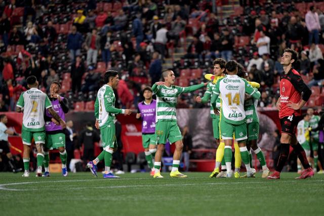 Santos' players celebrate after winning the Liga MX Clausura football match between Tijuana and Santos Laguna at Caliente stadium in Tijuana, Mexico on March 8, 2026. (Photo by Guillermo ARIAS / AFP)