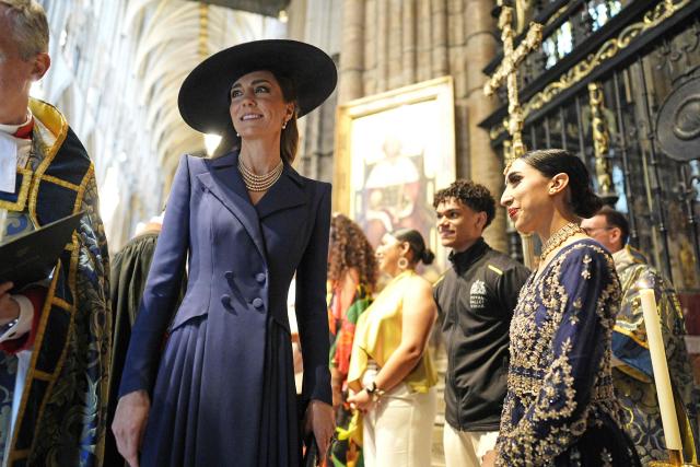 Britain's Catherine, Princess of Wales speaks to attendees during the annual Commonwealth Day service ceremony at Westminster Abbey in London, on March 9, 2026. (Photo by Aaron Chown / POOL / AFP)