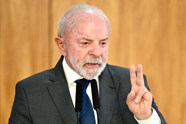 Brazil's President Luiz Inacio Lula da Silva gestures during a press statement after meeting South African President Cyril Ramaphosa at the Planalto Palace in Brasilia, on March 9, 2026. (Photo by Evaristo Sa / AFP)