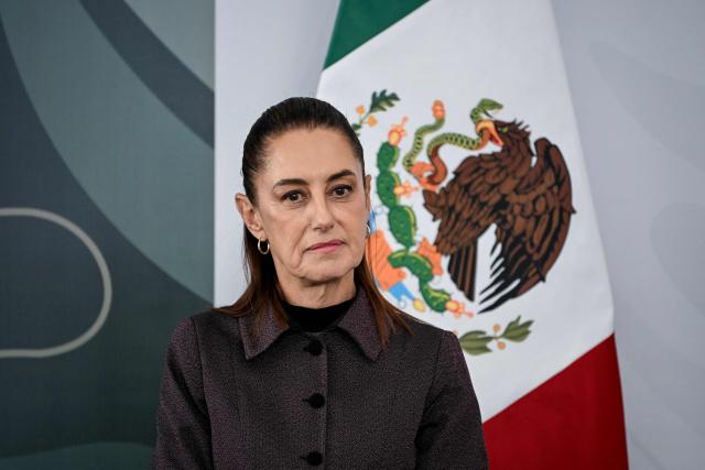 Mexico's President Claudia Sheinbaum looks on during her daily press conference at the Women's Oncology Hospital in Mexico City on March 9, 2026. Mexican President Claudia Sheinbaum called on March 9 on the United States to halt the flow of weapons to her country's drug cartels, after President Donald Trump criticized her record on fighting the groups. (Photo by Yuri CORTEZ / AFP)