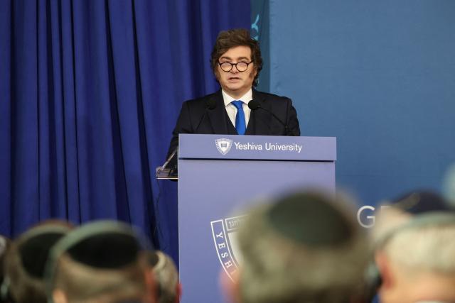 Argentina's President  Javier Milei Argentina’s President Milei speaks with Yeshiva University President Rabbi Dr. Ari Berman as part of the university’s “Great Conversations” series during an “Argentina Week” discussion focusing on global economic leadership and voicing support for the State of Israel on March 9, 2026 in New York City. (Photo by ANGELA WEISS / AFP)