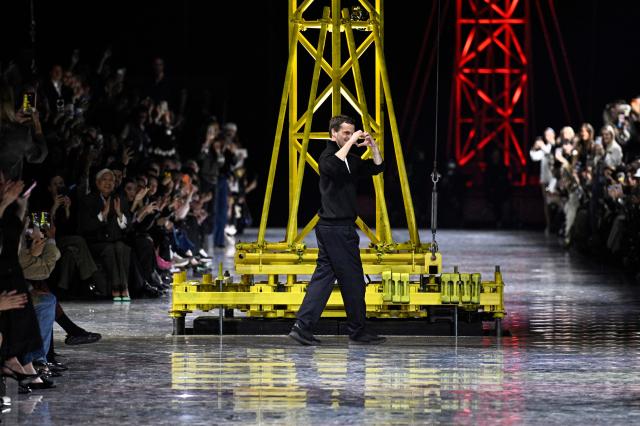 Franco-Belgian fashion designer Matthieu Blazy acknowledges the audience at the end of the Chanel Women's Ready to Wear Fall/Winter 2026-2027 collection fashion show as part of the Paris Women Fashion Week, in Paris, on March 9, 2026. (Photo by JULIEN DE ROSA / AFP)