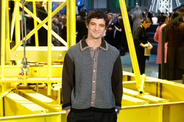 French-Canadian actor Niels Schneider poses during a photocall upon arrival to attend the Chanel Women's Ready to Wear Fall/Winter 2026-2027 collection fashion show as part of the Paris Women Fashion Week, in Paris, on March 9, 2026. (Photo by GEOFFROY VAN DER HASSELT / AFP)