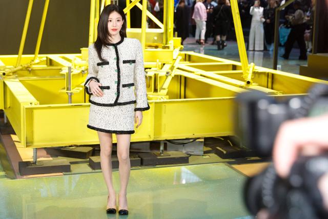South Korean actress and model Go Yoon Jung poses during a photocall upon arrival to attend the Chanel Women's Ready to Wear Fall/Winter 2026-2027 collection fashion show as part of the Paris Women Fashion Week, in Paris, on March 9, 2026. (Photo by GEOFFROY VAN DER HASSELT / AFP)