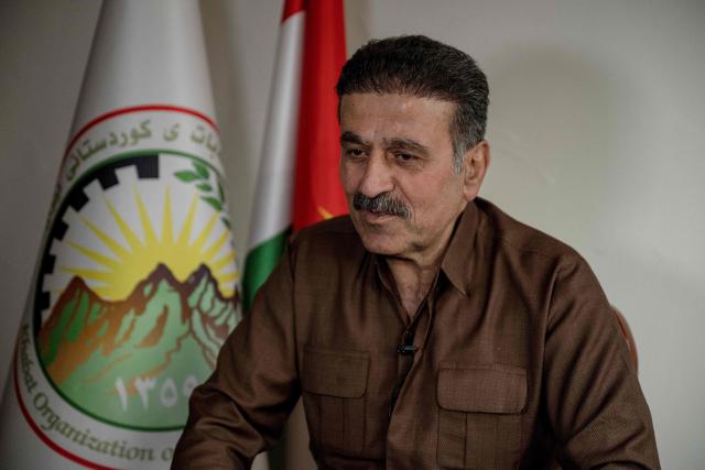 Huseyin Babasex, general secretary of the The Organization of Iranian Kurdistan Struggle (Sazmani Khabat) speaks during an interview at their base near Erbil, in Iraq's northern autonomous Kurdish region on March 9, 2026. Iran has designated Kurdish rebels groups as terrorist organisations, and many have previously fought its security forces in Kurdish-majority areas along the border. (Photo by Ozan KOSE / AFP)