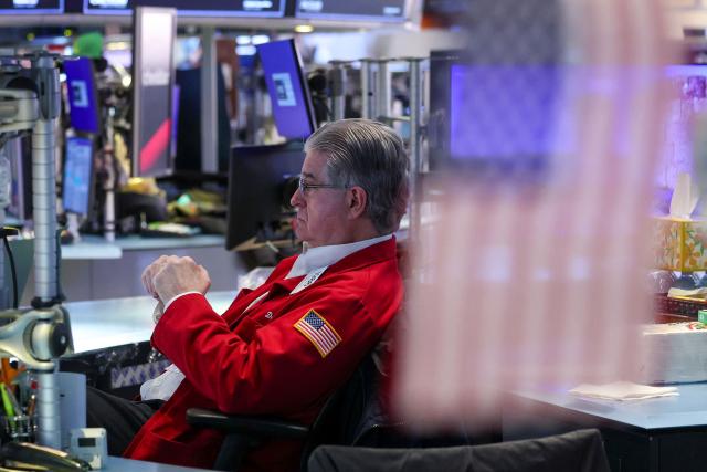 A trader works on the floor of the New York Stock Exchange (NYSE) during International Womens Day on March 9, 2026 in New York City. Wall Street stocks vaulted into positive territory after President Donald Trump described the US-Israeli war with Iran as "pretty much" over without giving details of any solution to the conflict still raging in the Middle East. All three major indices moved suddenly higher after the comments were reported, with the Dow Jones Industrial Average finishing 0.5 percent up at 47,740.80, a swing of 1,125 points from earlier in the day. (Photo by ANGELA WEISS / AFP)