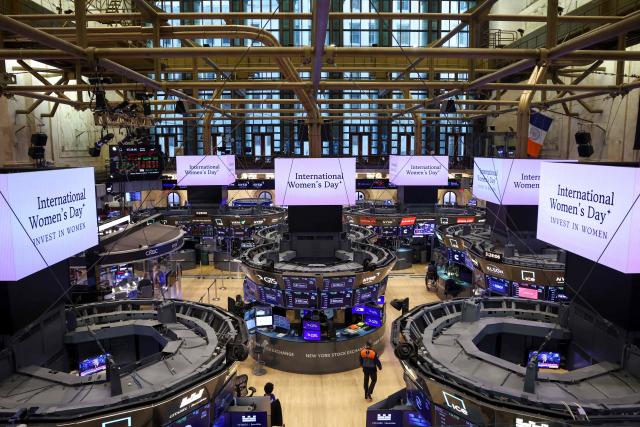 A trader works on the floor of the New York Stock Exchange (NYSE) during International Womens Day on March 9, 2026 in New York City. Wall Street stocks vaulted into positive territory after President Donald Trump described the US-Israeli war with Iran as "pretty much" over without giving details of any solution to the conflict still raging in the Middle East. All three major indices moved suddenly higher after the comments were reported, with the Dow Jones Industrial Average finishing 0.5 percent up at 47,740.80, a swing of 1,125 points from earlier in the day. (Photo by ANGELA WEISS / AFP)