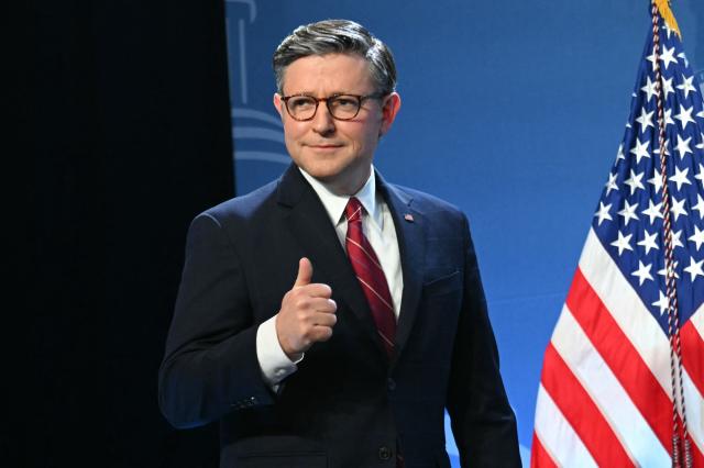 US House Speaker Mike Johnson gives a thumbs up as he arrives at the Republican Members Issue Conference at Trump National Doral in Miami, Florida, on March 9, 2026. (Photo by SAUL LOEB / AFP)