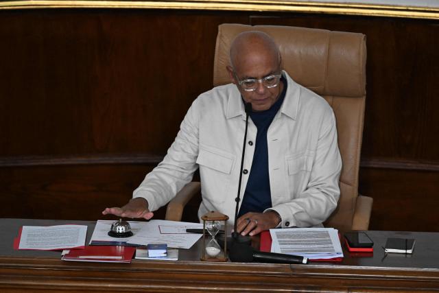 Venezuela's National Assembly President Jorge Rodriguez (L) attends the first session of a new mining law debate at the National Assembly in Caracas on March 9, 2026. Venezuela begins debate on a new mining law on Marc 9, 2026, that seeks to attract foreign capital, amid renewed relations with the US following the fall of Nicolas Maduro. (Photo by Juan BARRETO / AFP)