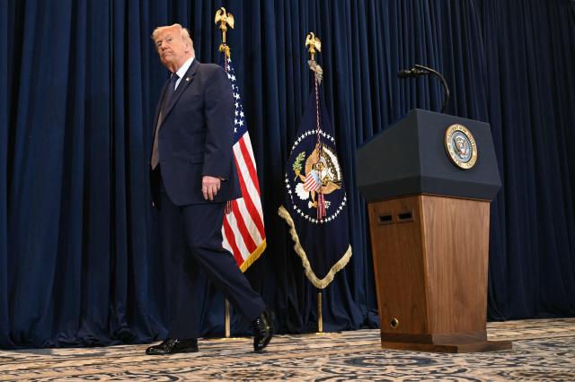 US President Donald Trump leaves after a press conference at Trump National Doral in Miami, Florida, on March 9, 2026. (Photo by SAUL LOEB / AFP)