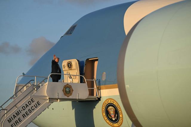 US President Donald Trump boards Air Force One at Miami International Airport in Miami, Florida, on March 9, 2026, as he travels back to Washington, DC. (Photo by SAUL LOEB / AFP)