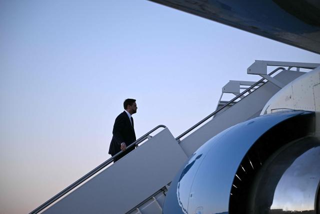 US Vice President JD Vance boards Air Force Two at Joint Base Andrews, Maryland while on his way to Dover, Delaware to attend the dignified transfer solemn event for a US Army soldier on March 9, 2026. (Photo by Brendan SMIALOWSKI / AFP)