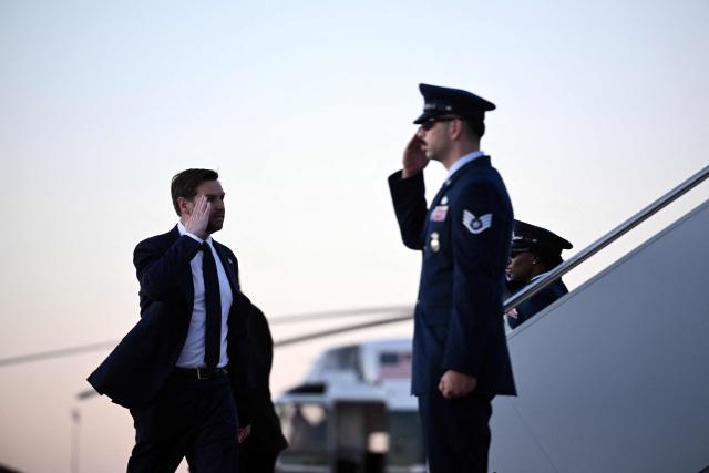 US Vice President JD Vance boards Air Force Two at Joint Base Andrews, Maryland while on his way to Dover, Delaware to attend the dignified transfer solemn event for a US Army soldier on March 9, 2026. (Photo by Brendan SMIALOWSKI / AFP)