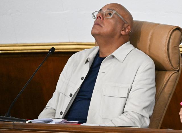 Venezuela's National Assembly President Jorge Rodriguez reacts during the new mining bill debate at the National Assembly in Caracas on March 9, 2026. Venezuela begins debate on a new mining law on Marc 9, 2026, that seeks to attract foreign capital, amid renewed relations with the US following the fall of Nicolas Maduro. (Photo by Juan BARRETO / AFP)