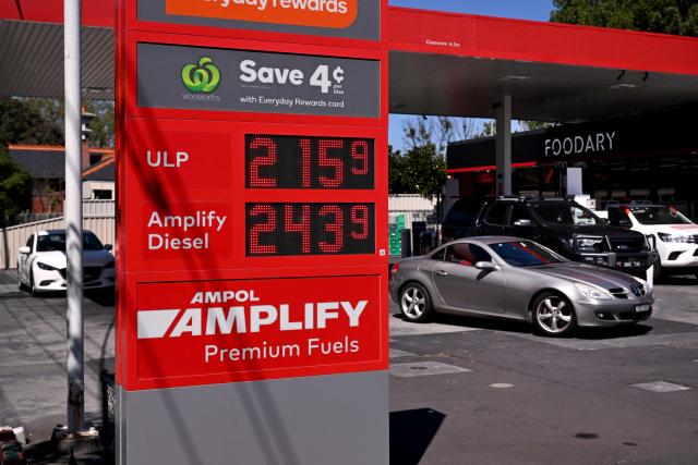 A sign outside a fuel station in Melbourne on March 10, 2026 shows the soaring price of petrol and diesel prices due to the Middle East conflict. Global oil prices have climbed dramatically since the war, prompting warnings that high fuel prices could drive inflation above 5 per cent in Australia. (Photo by William WEST / AFP)