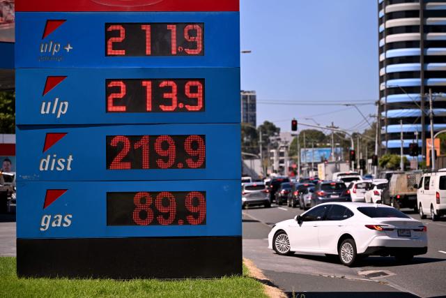 A sign outside a fuel station in Melbourne on March 10, 2026 shows the soaring price of petrol and diesel prices due to the Middle East conflict. Global oil prices have climbed dramatically since the war, prompting warnings that high fuel prices could drive inflation above 5 per cent in Australia. (Photo by William WEST / AFP)