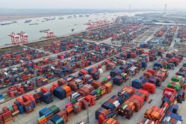 Cargo containers are seen in Nanjing port, in China’s eastern Jiangsu province on March 10, 2026. (Photo by CN-STR / AFP) / China OUT