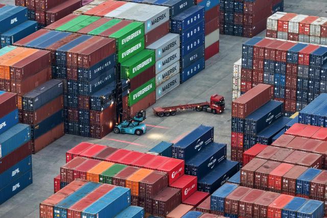 Cargo containers are seen in Nanjing port, in China’s eastern Jiangsu province on March 10, 2026. (Photo by CN-STR / AFP) / China OUT