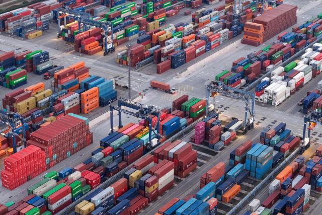 Cargo containers are seen in Nanjing port, in China’s eastern Jiangsu province on March 10, 2026. (Photo by CN-STR / AFP) / China OUT