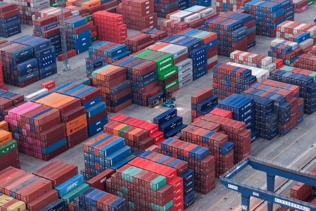 Cargo containers are seen in Nanjing port, in China’s eastern Jiangsu province on March 10, 2026. (Photo by CN-STR / AFP) / China OUT