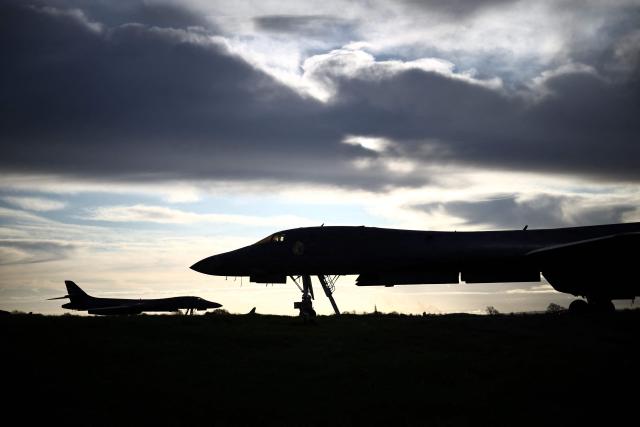 US Air Force B-1 Lancer bombers are pictured on the tarmac after arriving overnight at RAF Fairford in south-west England, early on March 10, 2026. Fairford is one of two bases, along with the Diego Garcia facility in the Indian Ocean, that the UK has given the US permission to use for "specific defensive operations into Iran" to destroy Iranian missiles at source, the British defence minister said in a statement. (Photo by Henry Nicholls / AFP)