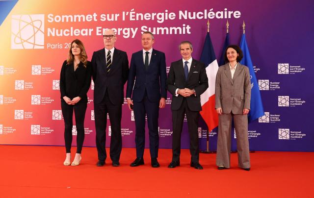 (From L) France's Government Spokesperson Maud Bregeon, France's Economy, Finances and Industry Minister Roland Lescure, Lithuania's Minister of Energy Zygimantas Vaiciunas, Director General of the International Atomic Energy Agency (IAEA) Rafael Grossi and Director of Strategic Analysis at the French Alternative Energies and Atomic Energy Commission Melanie Rosselet attend the Nuclear Energy Summit at the Seine Musicale in Boulogne-Billancourt outside Paris, France on March 10, 2026. (Photo by Abdul Saboor / POOL / AFP)