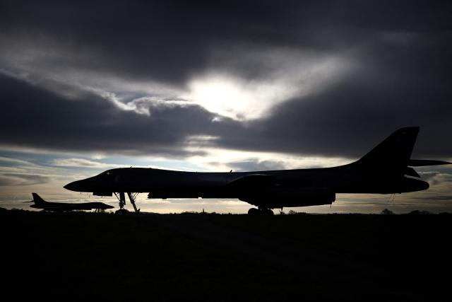 US Air Force B-1 Lancer bombers are pictured on the tarmac after arriving overnight at RAF Fairford in south-west England, early on March 10, 2026. Fairford is one of two bases, along with the Diego Garcia facility in the Indian Ocean, that the UK has given the US permission to use for "specific defensive operations into Iran" to destroy Iranian missiles at source, the British defence minister said in a statement. (Photo by Henry Nicholls / AFP)