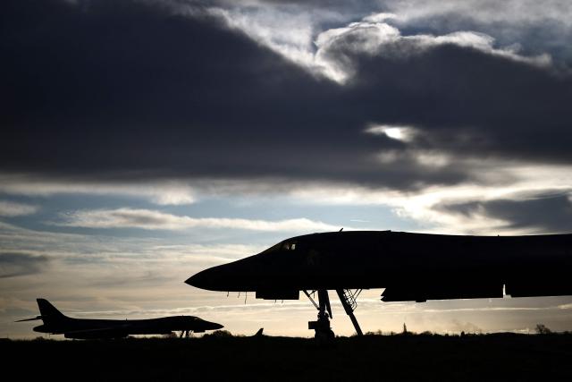 US Air Force B-1 Lancer bombers are pictured on the tarmac after arriving overnight at RAF Fairford in south-west England, early on March 10, 2026. Fairford is one of two bases, along with the Diego Garcia facility in the Indian Ocean, that the UK has given the US permission to use for "specific defensive operations into Iran" to destroy Iranian missiles at source, the British defence minister said in a statement. (Photo by Henry Nicholls / AFP)