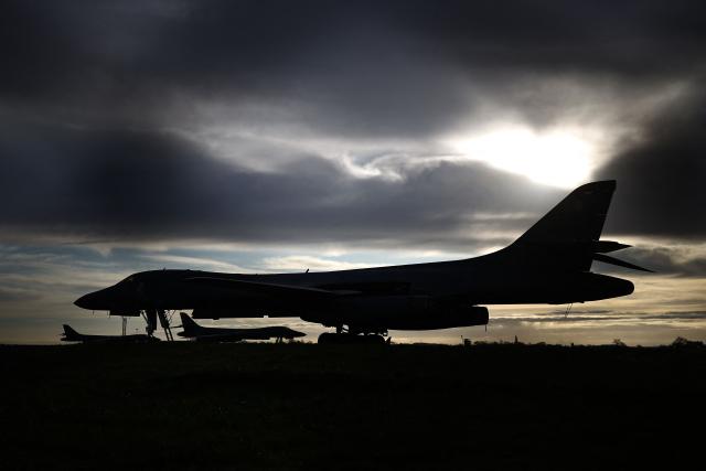 US Air Force B-1 Lancer bombers are pictured on the tarmac after arriving overnight at RAF Fairford in south-west England, early on March 10, 2026. Fairford is one of two bases, along with the Diego Garcia facility in the Indian Ocean, that the UK has given the US permission to use for "specific defensive operations into Iran" to destroy Iranian missiles at source, the British defence minister said in a statement. (Photo by Henry NICHOLLS / AFP)
