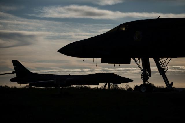 US Air Force B-1 Lancer bombers are pictured on the tarmac after arriving overnight at RAF Fairford in south-west England, early on March 10, 2026. Fairford is one of two bases, along with the Diego Garcia facility in the Indian Ocean, that the UK has given the US permission to use for "specific defensive operations into Iran" to destroy Iranian missiles at source, the British defence minister said in a statement. (Photo by Henry Nicholls / AFP)