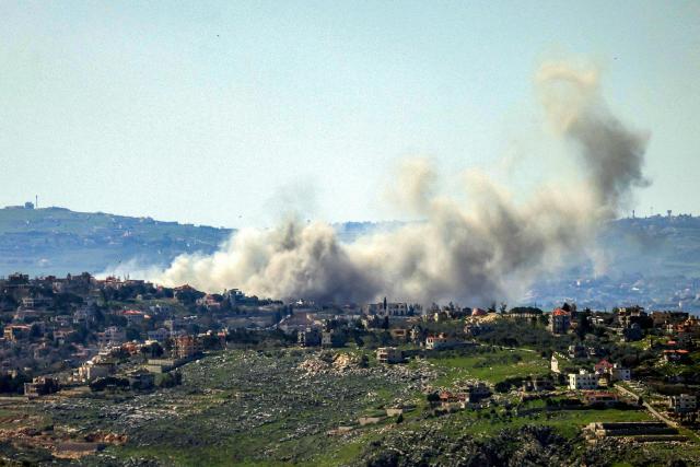 TOPSHOT - Smoke rises following an Israeli airstrike on the village of Taybeh in southern Lebanon as seen from nearby Marjeyoun on March 10, 2026. Lebanon was drawn into the Middle East war last week when Iran-backed militant group Hezbollah attacked Israel in response to the killing of the Iranian supreme leader during US-Israeli strikes on February 28. (Photo by Rabih DAHER / AFP) / Attention editors: AFP covers the war in the Middle East through its extensive regional network, including bureaus in Tehran, Jerusalem, and several neighboring countries. Since the start of the conflict, journalists have been working under increasingly restrictive conditions. Authorities in several countries have limited reporters' movements, photo and live video coverage from sensitive locations. Some governments and armed groups have banned images of missile or drone strikes and other security-related sites. / 