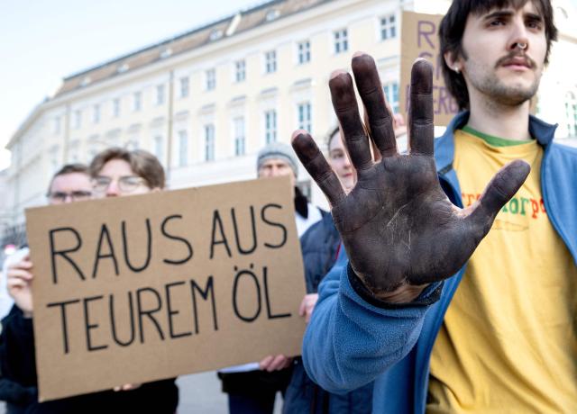 Fridays for Future activists protest outside the Federal Chancellery in Vienna on March 10, 2026, calling for a climate-friendly June budget without oil and gas subsidies. As crude oil prices rise, the impact goes far beyond Austria’s petrol stations, since the long-term costs of fossil-fuel investments are far higher due to global-warming impacts. (Photo by Joe Klamar / AFP)