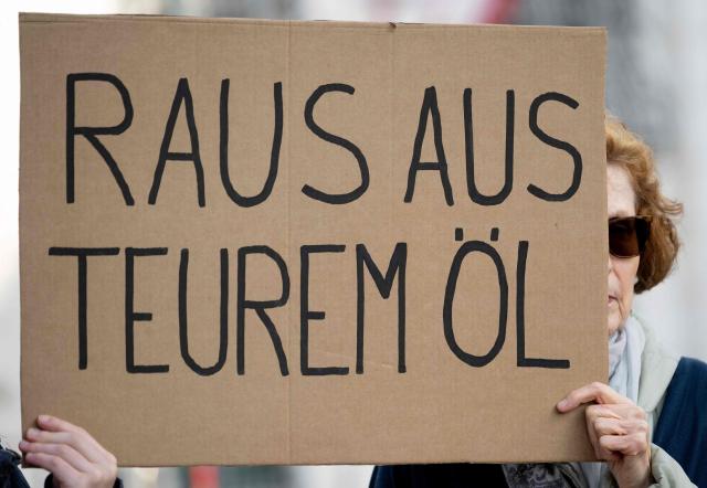 Fridays for Future activists protest outside the Federal Chancellery in Vienna on March 10, 2026, calling for a climate-friendly June budget without oil and gas subsidies. As crude oil prices rise, the impact goes far beyond Austria’s petrol stations, since the long-term costs of fossil-fuel investments are far higher due to global-warming impacts. (Photo by Joe Klamar / AFP)